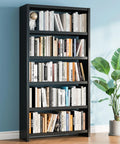 Rock Solid 5 Tier Metal Bookshelf Black Heavy Duty Industrial Bookcase 69 Inches Tall filled with books against a blue wall.