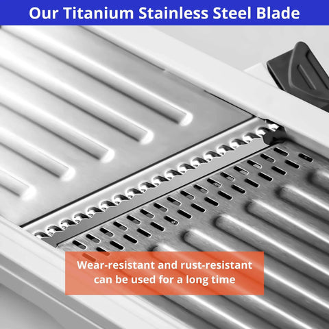 Close-up view of titanium stainless-steel blade on a 24-in-1 mandoline slicer with perforated cutting surface