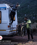 Person climbing RV ladder using 600 Lumen Headlamp With Red Rear Safety Light For Hard Hat Use, 65 Degree Swivel Focus