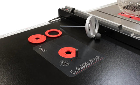 Pro Grade Aluminum Tabletop Router Lift featuring a smooth surface with red rings and gauge on a black workbench.