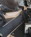 Close-up of Professional Grade Miter Saw Jig delivering dead nuts accurate cuts, featuring solid angle guiding mechanism in use.