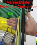 Hand holding 1/4 inch black bungee cord among other cords showing thickness comparison, highlighting marine-grade variety.