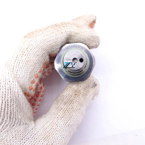 Proportional Pressure Reducing Valve R900726604 12V 1.8A 20W Solenoid Valve top view in gloved hand, hydraulic systems part