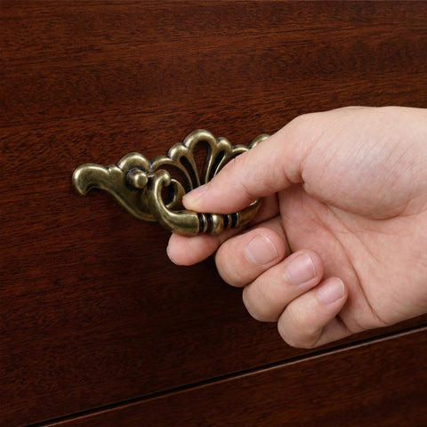 Hand pulling on Antique Brass Bail Drawer Pull from 6 Pack, Vintage Zinc Alloy Cabinet Handles With Screws, 6 Inch Total Length