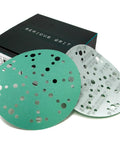 Front view: Serious Grit 6-inch sanding discs, 49-hole, 120-grit, hook-and-loop film, green front, gray back, 50-pack.