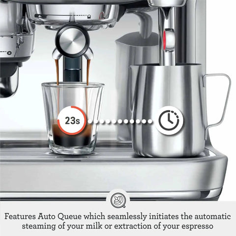 Oracle Jet Semi Automatic Espresso Machine Featuring Precise Heat Control Silky Milk Frothing Swipe Interface And Cold Brew Mode For Next Level Coffee Vibes At Home brewing espresso into a glass.