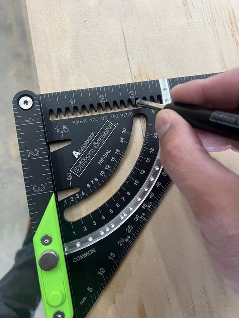 Precision Aluminum 7 Inch Rafter Square With Locking Pivot Arm And Angle Finder Featuring Three Level Vials marking on wood.