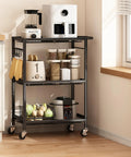 Kitchen setup with Three-Tier Rolling Cart With 150 Pound Capacity, stocked with utensils and containers, near countertop