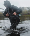 Rugged Portable Outdoor Bluetooth Speaker With Ultra Loud 120dB Sound, IP67 Waterproof And Dustproof, used by man wading in water