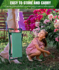 Person carrying Foldable Garden Kneeler Seat With Handles And Tool Bags, 2 In 1 Grab-And-Go Lightweight Stool near blooming flowers
