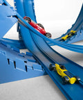 Blue Two Lane 18-Foot Race Track Stunt Set with Ramps, featuring two racing cars on curved track section.