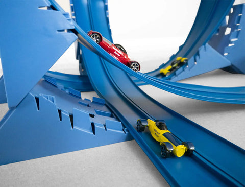 Blue Two Lane 18-Foot Race Track Stunt Set with Ramps, featuring two racing cars on curved track section.