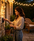 Woman plugging Hella Durable 3 Ft Outdoor Extension Cord With Snappy Inline Switch And Bright Led Indicator into wall outdoors.