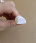 Close-up of Flexible Door Molding Trim Rope Edge Wall And Cabinet Dope 0.6in X 115in showing white PVC material and rope-like profile
