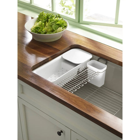 Riverby White Rinsing Colander With Built In Cutting Board on sink, showing drain holes and dual function board for veggies