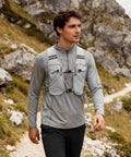 Man hiking wearing Ultralight Running Vest With Breathable Quick Dry Mesh Chest Pack Hydration Ready Kit For Runners And Outdoorsy Folks Adjustable Straps Waterproof Phone Pocket Great For Hiking Cycling Camping And Climbing.