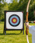 Archer aiming at target secured with 16 Pack Archery Target Pins For Holding Target Faces And Paper On EVA Foam Targets outdoors.