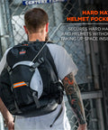 Back view of Arsenal 5188 Jobsite Backpack With Hard Hat Storage worn by person, featuring 39L capacity and durable 600D ripstop exterior.