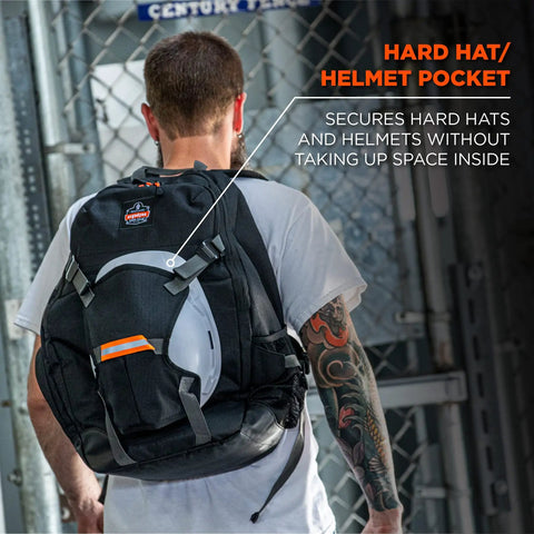 Back view of Arsenal 5188 Jobsite Backpack With Hard Hat Storage worn by person, featuring 39L capacity and durable 600D ripstop exterior.