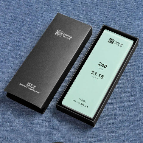 Professional Glass Sharpening Stone Whetstone 15,000 Grit For Razor Sharp Knives with box on fabric surface