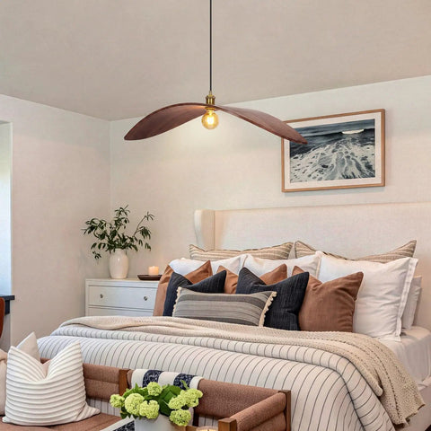 33.4" Large Wood Pendant Lights, Mid-Century Modern Natural Black Walnut Wood Pendant Light Fixture hanging over a cozy bedroom.