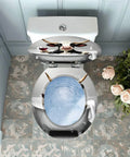 Round Toilet Seat Resin for Farmhouse Bathroom showing cow design with wine glasses and blue water, top view.