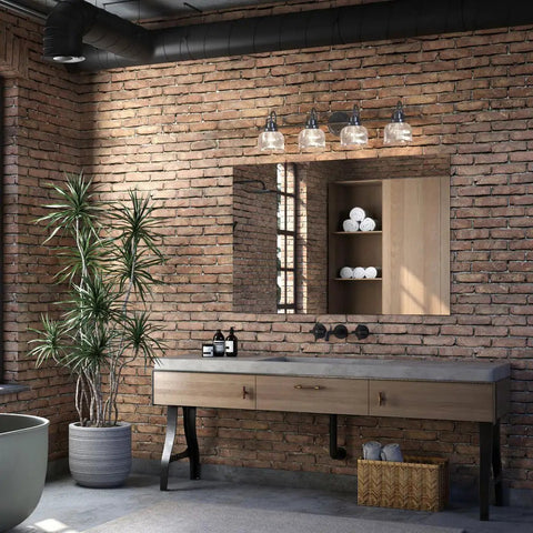 Archie Collection 4-Light Bath Vanity Light With Clear Double Prismatic Glass Shades In Venetian Bronze Finish above mirror
