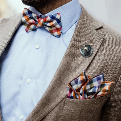 Man in suit wearing Dragon Boat Button Pins Round Lapel Badges Funny Office Gift For Bosses And Weddings Easy Clip On Durable.