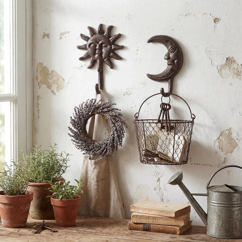 Solid As A Rock Vintage Cast Iron Sun Moon Wall Hooks Heavy Duty Decorative Hanging Hangers For Coats Scarves Bags Towels Keys Real Deal Storage Upgrade With Hardware Included For Everyday Use with wreath and basket.