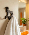 Built Solid Cast Iron Wall Mount Pet Hooks Set Of Two Double Hook Design Rustic Brown Finish Includes All Necessary Screws For Quick Hang Any Spot In The House Or Shed, featuring dog-shaped hook with towel.