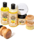 Three Step Cutting Board Care Kit with Soap Food Grade Mineral Oil and Wax for All Wood Boards shown with applicators and bottles.