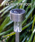 Solar Pathway Lights Stainless Steel IP44 Waterproof Auto On Off Outdoor LED Landscape Lighting for Garden Yard Patio Path and Walkway 12 Pack Cool White close-up view in rain