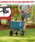 Person using 60 Lb Walk Behind Lawn Broadcast Spreader for lawns with adjustable flow control, covering 15,000 sq ft.