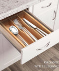 Compact Bamboo Kitchen Drawer Organizer Grooved Slots Keep Silverware Utensils Flatware in a sleek drawer setup.