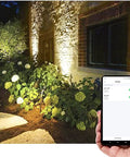 2.4Ghz WiFi Bluetooth RGB Landscape Lights Kit illuminating garden with smartphone app control visible