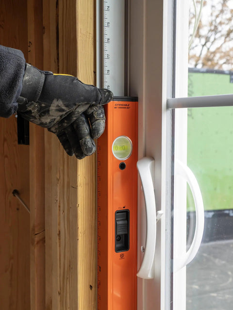 Hefty 48 To 80 Inch Telescoping Box Beam Level With Lock Tight Extension And Legit Precision Edges Making Heavy Duty Carpenter Gear That Is Badass Tough For Nuts Accuracy On Any Active Job Site