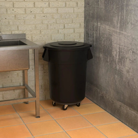 55 Gallon Black Round Commercial Trash Can With Lid And Dolly Built Tough Heavy Duty Food Grade NSF Certified Perfect For Restaurant Office School Garage Backyard Workshop Warehouse Durable Nesting Design in kitchen corner next to sink
