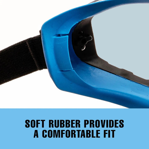 Close-up of blue tinted anti fog safety goggles with adjustable elastic headband highlighting soft rubber seal for comfort
