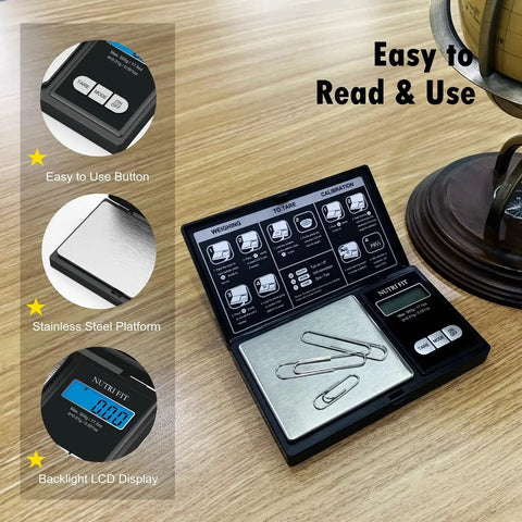 Pocket Grab N Go Precision Scale With 0.01g Accuracy, 500g Capacity, on wooden table with stainless steel platform and LCD display.