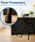 Black round rubber chair leg tip on stool, showcasing Three Quarters Inch Round Rubber Chair Leg Tips 4 Pack Nonslip Floor Protectors.