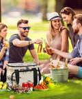 Group enjoying picnic with Desert Horseback Riding Insulated Lunch Bag, Leakproof Cooler Bag on grass with drinks and fruits