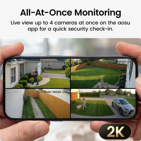 Person holding smartphone displaying 4-camera Solar Security Cameras Wireless Outdoor Home System With True 2K HD Video