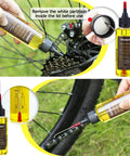 Applying lubricant from bike chain cleaner kit with chain lubricant and biodegradable degreaser to mountain bike gears.