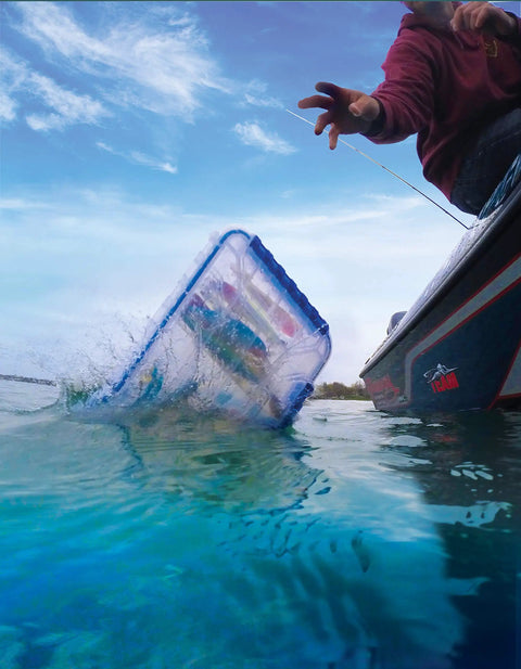 Waterproof Tuff Tainer Tackle Box With Zerust Anti Rust Tab For Lures Gear And Tackle 14 Inch Double Deep WP5000 Series shown splashing into water, demonstrating waterproof feature.