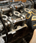 Mechanic using 30 Piece 12 Point Ratcheting Wrench Set SAE And Metric 1/4 To 1 Inch And 8-24 mm on engine component