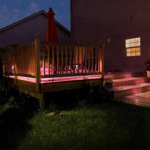 Neon Smart Indoor Outdoor Multi Color LED Light Strip 5M 16 Feet Waterproof RGB Tape with App Control lit on patio.