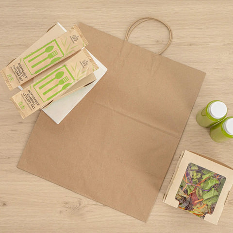 Large Kraft Paper Gift Bags With Handles 100 Pack Brown Eco Friendly Grocery Shopping Retail Takeout Bags Durable Loop Handles shown with takeout items