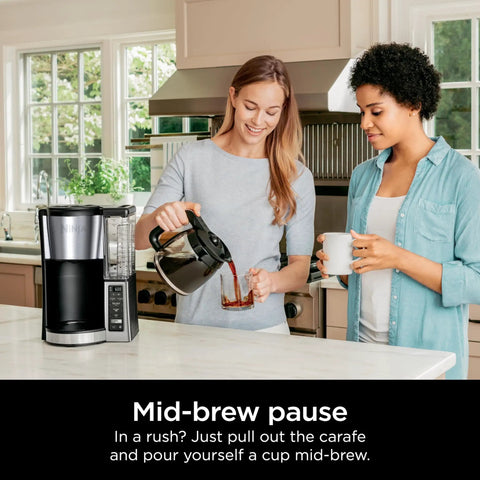 Two people using 12 Cup Programmable Coffee Brewer With Classic Or Rich Brew Styles, Adjustable Warm Plate, 60 Oz Water Reservoir.