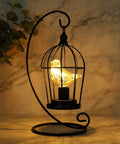Birdcage Bulb Decorative Lamp Battery Operated 13 Inch Tall Cordless Accent Light With Warm White Fairy Lights on marble surface.