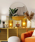 Cordless Battery Operated LED Glass Lamp With Timer Yellow Table Centerpiece in living room with plants and decor